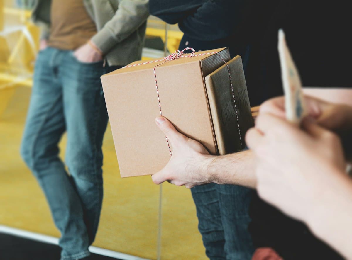 A parcel being handed over at the door